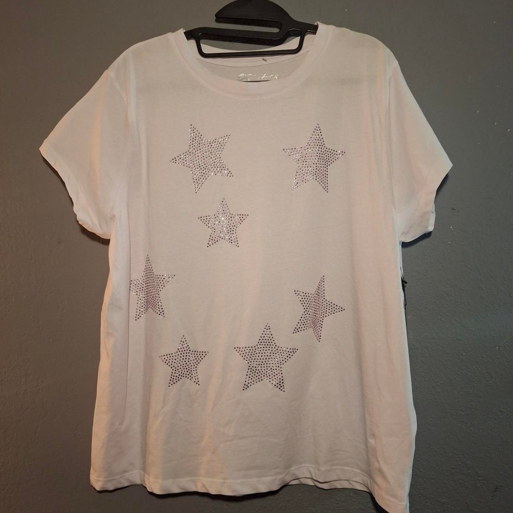 Pink stars on a white T